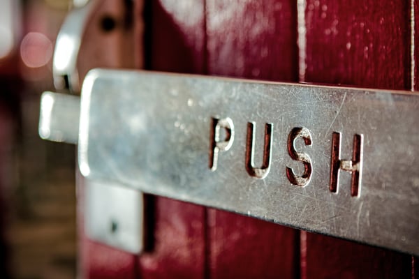 Image by Tim Mossholder, door labeled "push"
